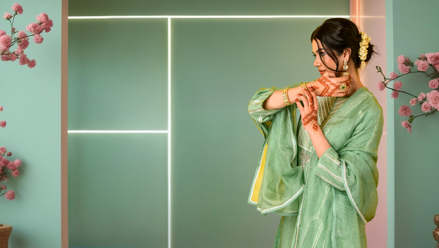  model showcasing new arrival Punjabi suits  with modern ethnic background